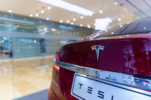 特斯拉、蔚来、理想、小鹏收入分析，及特斯拉全球交付量一览